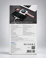 The back of a white ROCK brand product box for a wireless charger, featuring a dark image of a watch charging on a leather surface, with technical specifications and barcodes printed below.